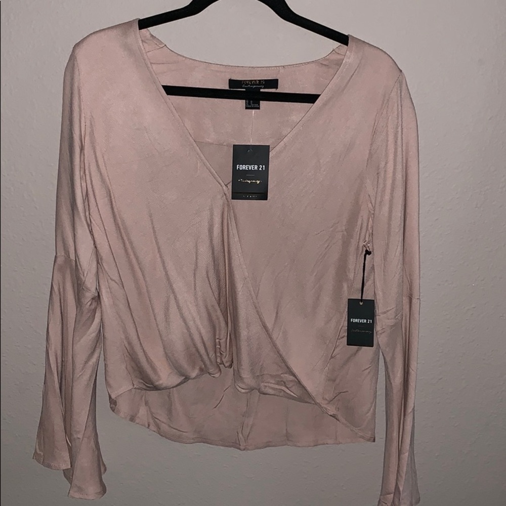 Light pink bell sleeved shirt